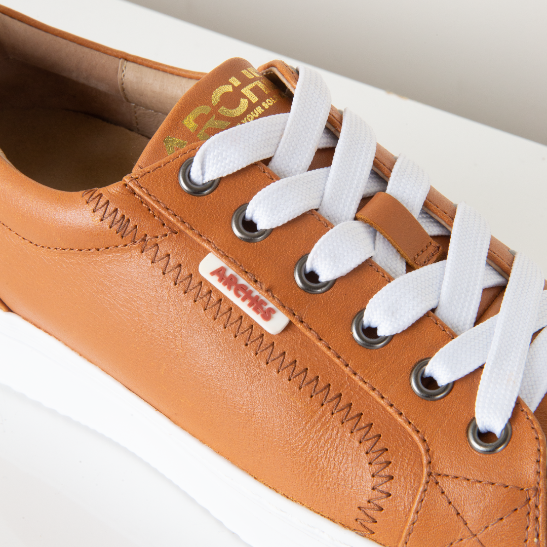 Arched sneakers discount